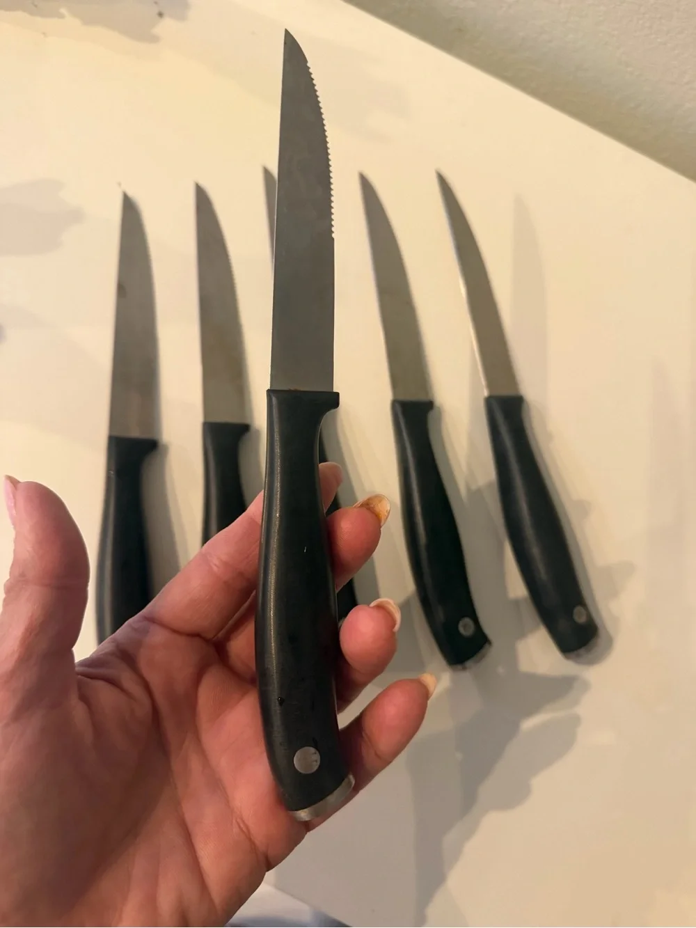 Set of 8 Henckels Cuttery Knives with Black  Handle